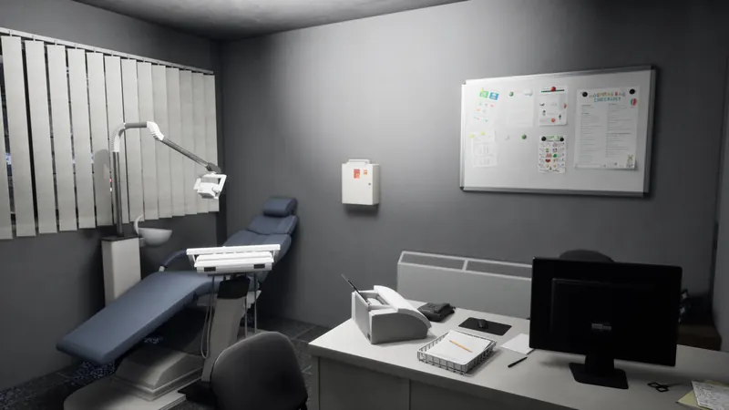 Examination room with a patient bed, whiteboard and doctor's desk