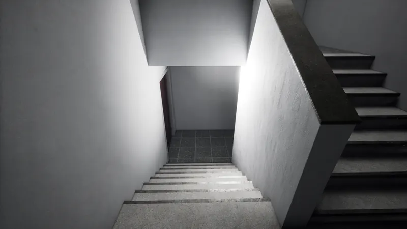 Concrete stairs descending to the floor below under a hard fall of light
